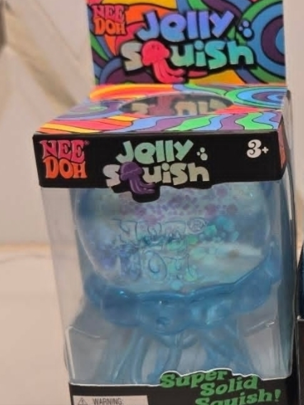 Nee Doh Jelly Squish Blue Glitter Jellyfish Squishy Toy